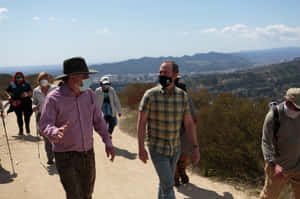 Adam Schiff Hiking With His Crew Wallpaper