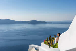 Adamant Girl Facing Sea Wallpaper