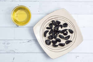 Add A Flavorful Kick To Your Meals With Black Garlic Wallpaper