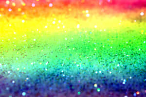 Add A Pop Of Colorful Sparkle To Your Space With Rainbow Glitter. Wallpaper