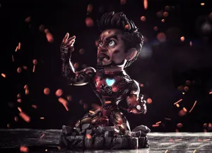 Add A Pop Of Superhero Style To Your Desk With Iron Man Bobbleheads Wallpaper