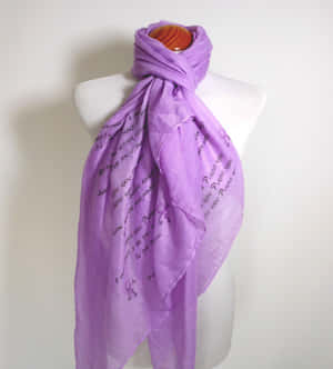 Add A Touch Of Elegance With A Beautiful Purple Scarf! Wallpaper