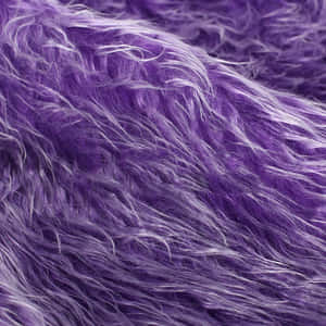 Add A Touch Of Luxury To Any Space With This Plush And Stylish Purple Faux Fur Wallpaper