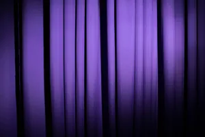 Add A Touch Of Luxury To Any Space With Vibrant, Purple Curtains Wallpaper