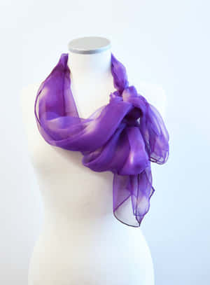 Add Style And Color To Any Outfit With A Purple Scarf! Wallpaper