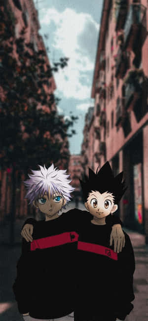 Add Thrill And Excitement To Your Phone With The Dynamic Duo Of Gon And Killua! Wallpaper