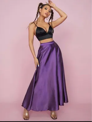 Adding Some Flower Power To Your Wardrobe With A Vibrant Purple Skirt Wallpaper