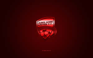 Adelaide United Players Celebrating Their Victory On The Field Wallpaper