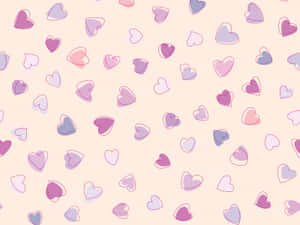 Adorable Collection Of Pink And Purple Hearts Floating Together Wallpaper