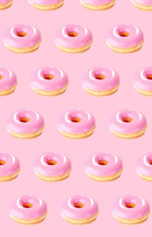 Adorable Donut With Sprinkles And Pink Icing Wallpaper