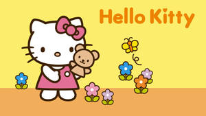 Adorable Hello Kitty On Yellow Desktop Wallpaper