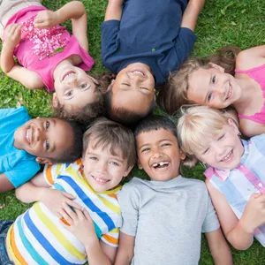 Adorable Siblings Sharing A Heartwarming Moment Together Wallpaper