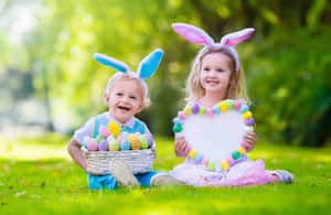 Adorable Toddlers Playing In A Park Wallpaper