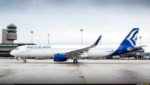 Aegean Airlines A321neo In Flight With Air Traffic Control Tower In View Wallpaper