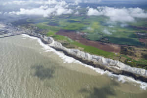 Aerial Shot Of White Cliffs Of Dover In England Wallpaper