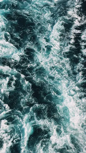 Aerial View Of A Rough Sea Wallpaper