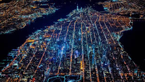 Aerial View Of New York City At Night Wallpaper