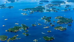 Aerial_ View_of_ Scattered_ Islands_ Archipelago Wallpaper