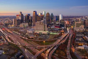 Aerial View Showcasing The Vibrant Dallas Skyline Wallpaper