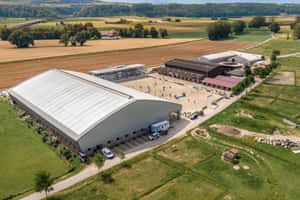 Aerial Viewof Industrial Facilityin Yverdon Les Bains Wallpaper