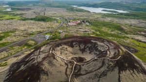Aerial Viewof Volcanic Craterand Landscape Wallpaper