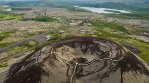 Aerial Viewof Volcanic Craterand Landscape Wallpaper