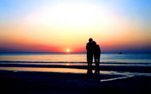 Aesthetic Couple Silhouette In Sunset Wallpaper