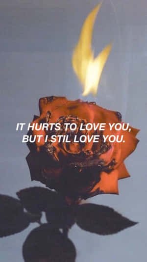 Aesthetic Fire Love Hurts Quote Wallpaper
