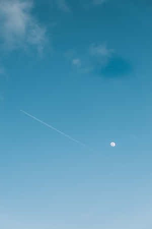 Aesthetic Light Blue Moon With Jet Plane Wallpaper