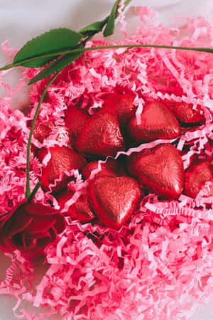 Aesthetic Valentine's Day Rose And Chocolates Wallpaper