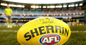 Afl Yellow Sherrin Football Wallpaper