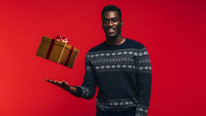 African Man With Gift Wallpaper