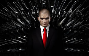 Agent 47 In His Signature Black Suit Wallpaper