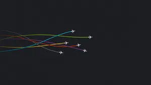 Agile Racing Planes In The Sky Wallpaper