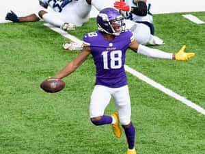 Agile Wide Receiver In Action Wallpaper