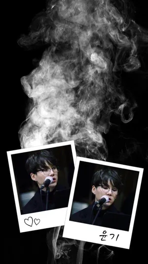 Agust D In A Bold And Dynamic Pose Wallpaper