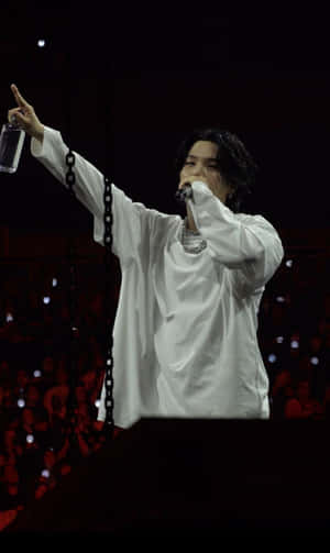 Agust D Striking A Pose In A Captivating Black And White Photo Wallpaper