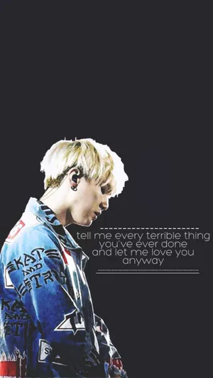 Agust D Striking A Pose In A Stylish Outfit Wallpaper