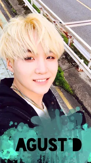 Agust D, The Ultimate Hip-hop Artist, Confidently Posing In A Monochrome Setting. Wallpaper