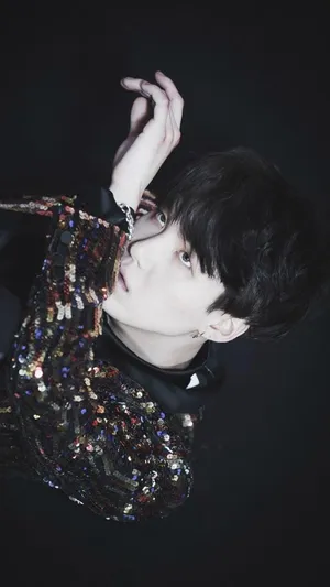 Agust D Unleashes His Fiery Charisma Wallpaper