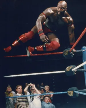 Ahmed Johnson, The Powerhouse Wrestler In Action Wallpaper