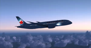 Air Canada Plane With Maple Leaf Logo Wallpaper
