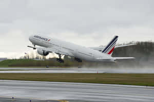 Air France Boeing Takeoffin Rain Wallpaper