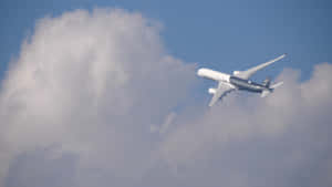 Airbus A350 In Flight Above Clouds Wallpaper