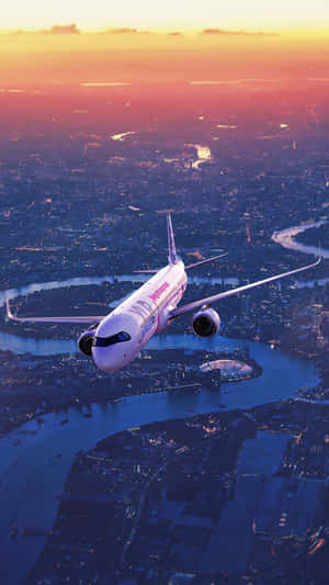 Airbus Over City Dusk Flight Wallpaper