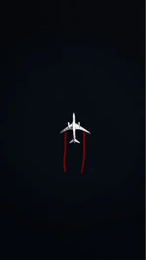 Airplane Overhead Viewwith Red Contrails Wallpaper