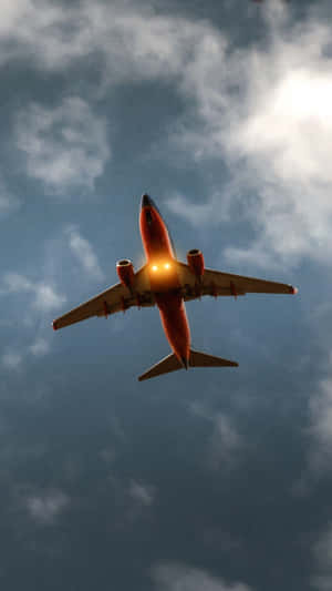 Airplane Sun Glare Cloudy Sky Wallpaper