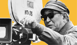Akira Kurosawa Behind The Scenes Of A Movie Production Wallpaper