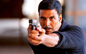 Akshay Kumar Pointing Gun Wallpaper