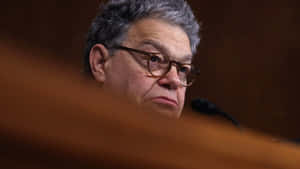 Al Franken Speaking During An Event Wallpaper